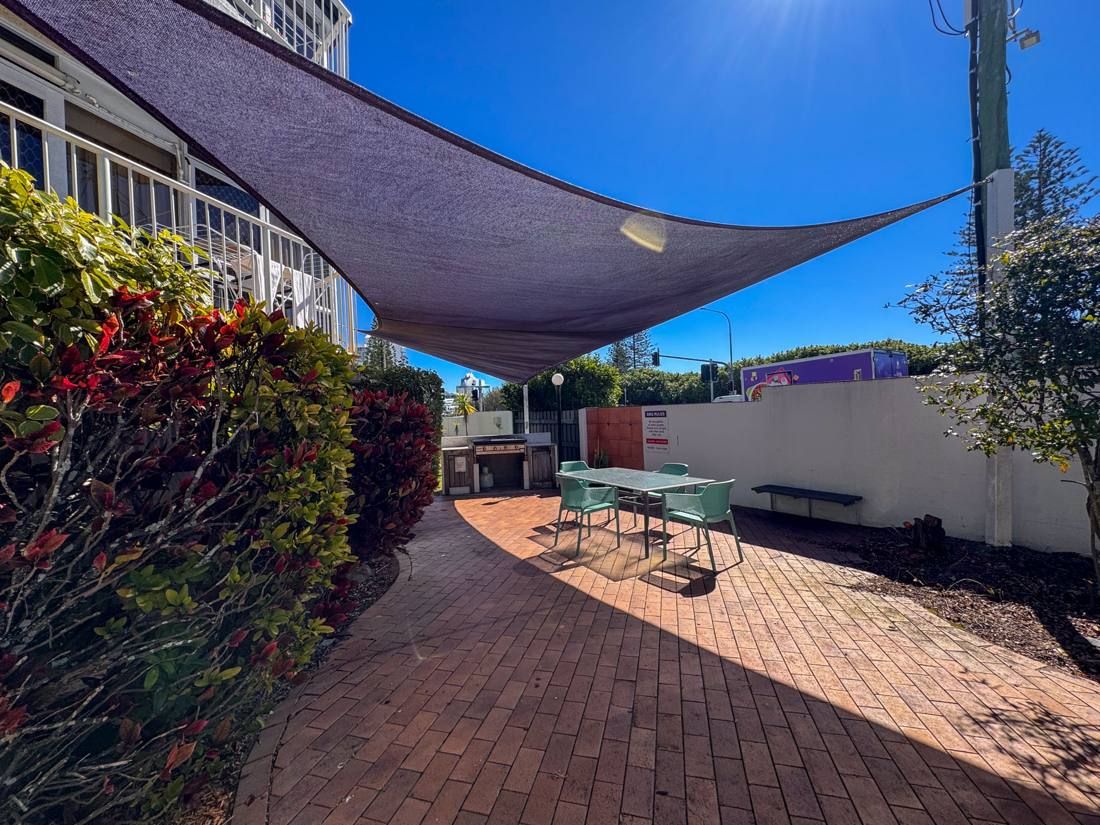 Shaded poolside BBQ courtyard, Northpoint Apartments Alexandra Headland