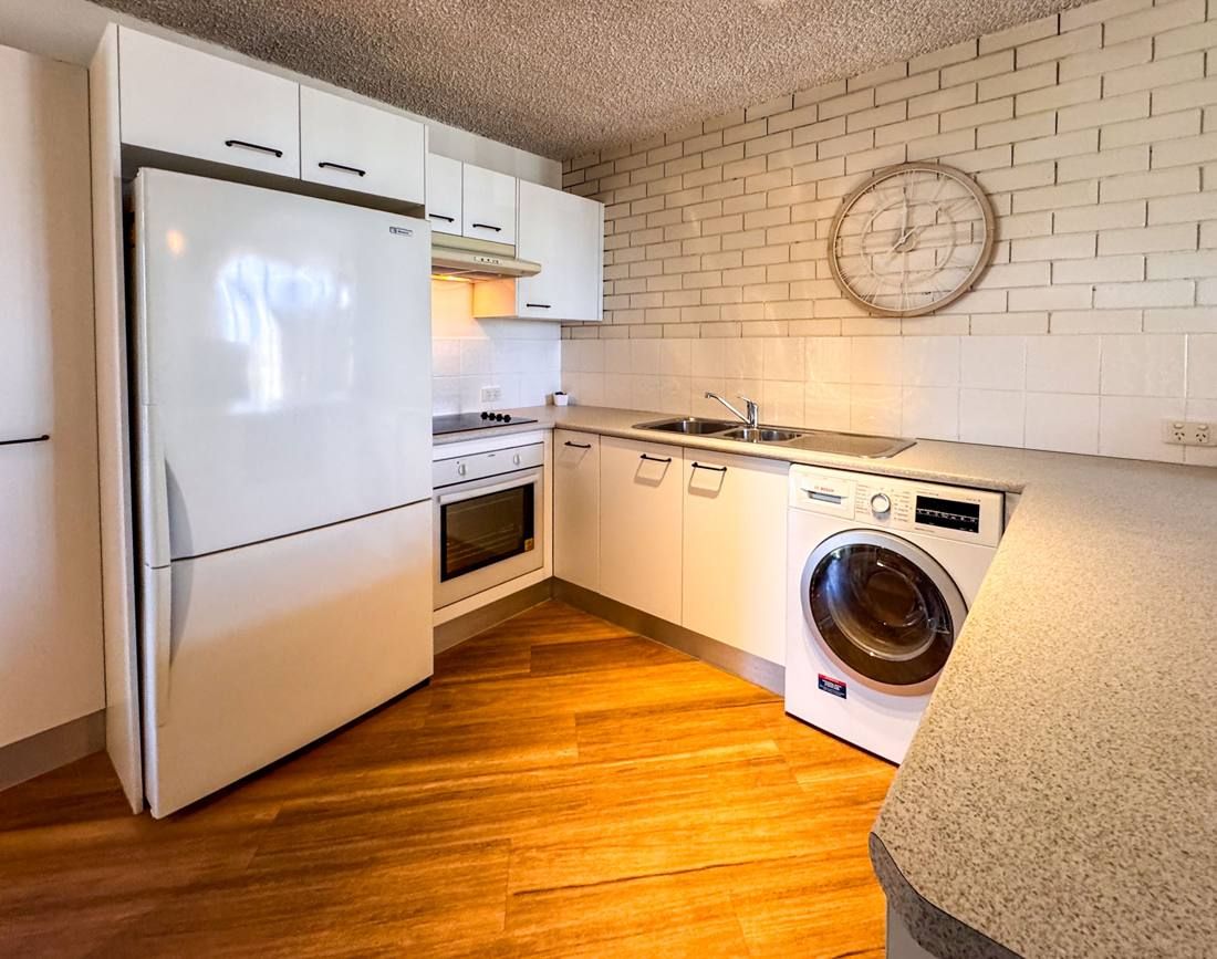 Kitchen and laundry, Northpoint Apartments Alexandra Headland