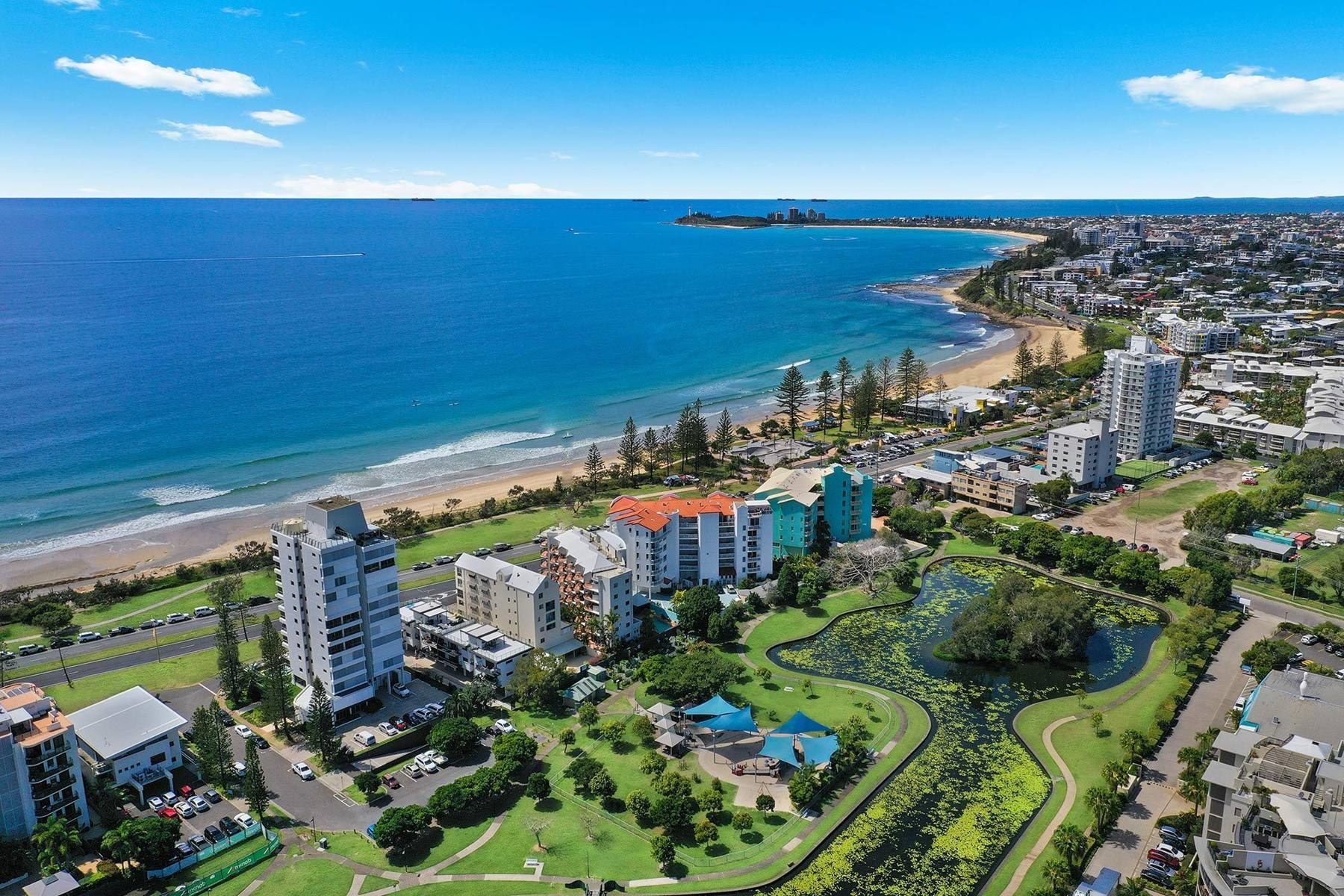 Aerial view of Alexandra Headland beach and Alexandra Parade, Sunshine Coast, with Northpoint Apartments marked